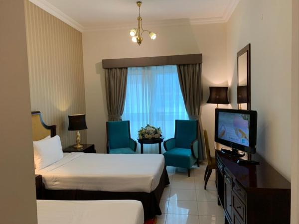 Al Manar Hotel Apartments : photo 1 de la chambre appartement 2 chambres