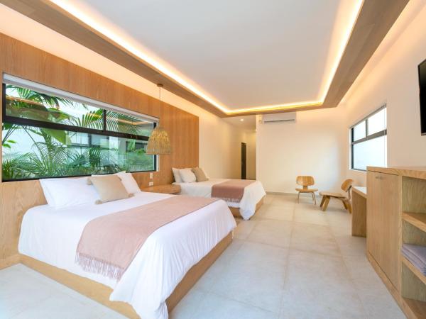 Mayan Monkey Tulum : photo 4 de la chambre chambre deluxe avec 2 lits queen-size