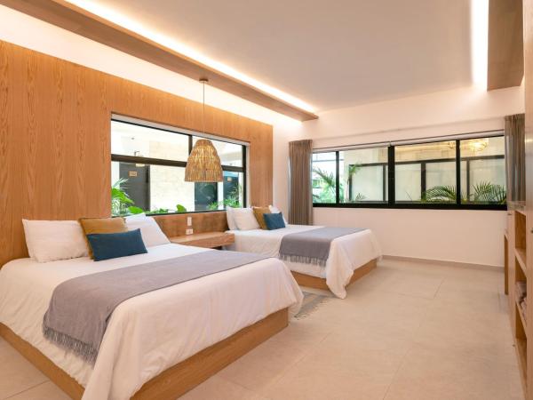 Mayan Monkey Tulum : photo 2 de la chambre chambre deluxe avec 2 lits queen-size