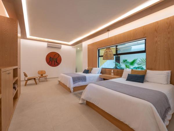 Mayan Monkey Tulum : photo 1 de la chambre chambre deluxe avec 2 lits queen-size