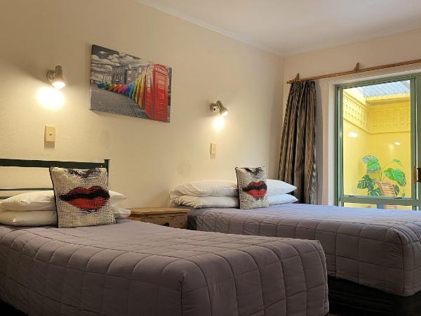 Rotorua Coachman Spa Motel : photo 3 de la chambre suite confort 2 chambres avec bain à remous