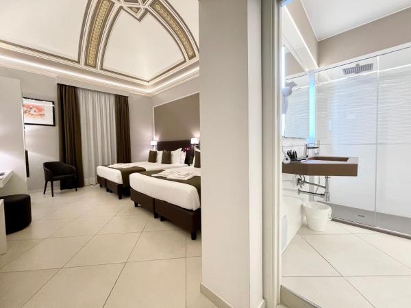 ETNEA STYLE CATANIA LUXURY ROOMS : photo 4 de la chambre chambre deluxe avec 2 lits queen-size