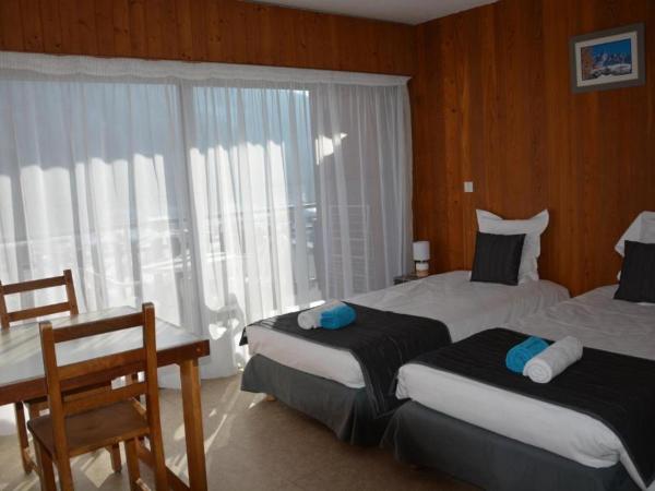 Village vacances Le Savoy : photo 1 de la chambre chambre lits jumeaux