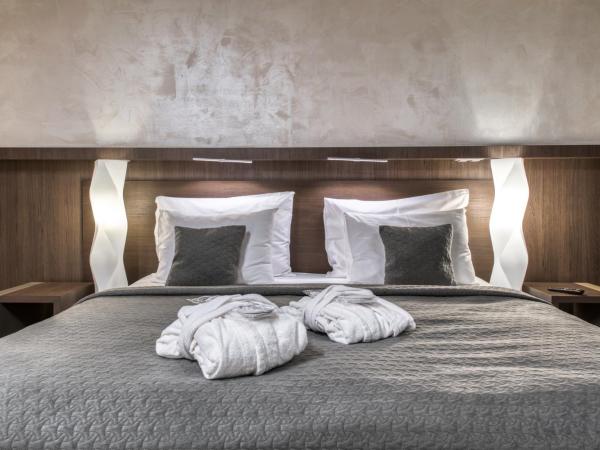 Volcano Spa Hotel : photo 3 de la chambre chambre quadruple de luxe avec accès gratuit au centre de bien-Être et à la salle de sport