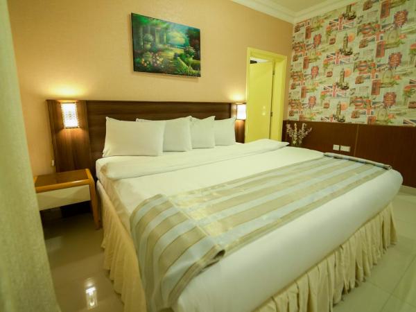 Al Ghubrah Plaza Hotel : photo 3 de la chambre chambre familiale deluxe