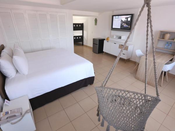 Cozumel Hotel & Resort Trademark Collection by Wyndham : photo 2 de la chambre chambre familiale avec lit king-size et 2 lits superposés - non-fumeurs