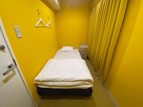 Hostel Anchorage : photo 3 de la chambre chambre simple avec toilettes et douche communes