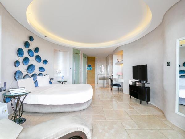 Sanya Phoenix Island Yuejia flat : photo 10 de la chambre chambre lit king-size deluxe - vue sur mer