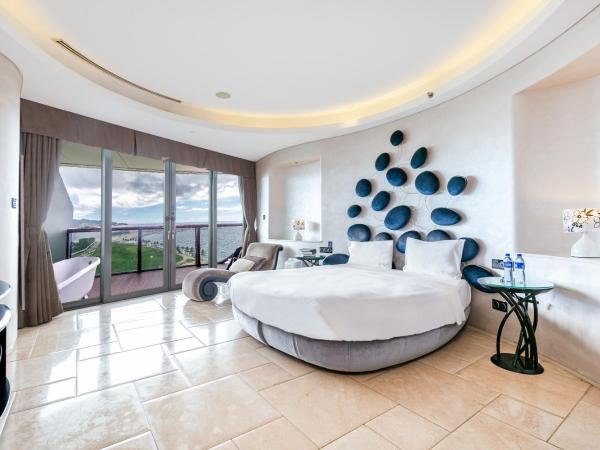 Sanya Phoenix Island Yuejia flat : photo 9 de la chambre chambre lit king-size deluxe - vue sur mer