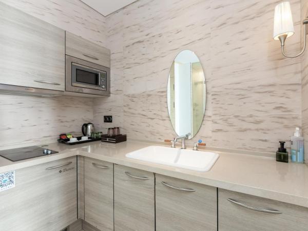 Sanya Phoenix Island Yuejia flat : photo 8 de la chambre studio - vue sur mer