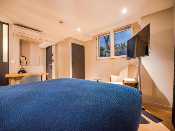 Residence Les Boulevards : photo 8 de la chambre studio lit queen-size