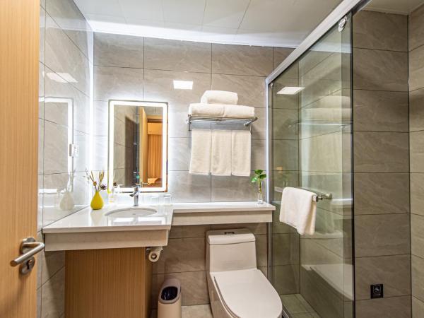 Shanghai JOYFUL YARD Hotel-Free shuttle bus from Pudong Airport and Disneylan : photo 2 de la chambre chambre familiale