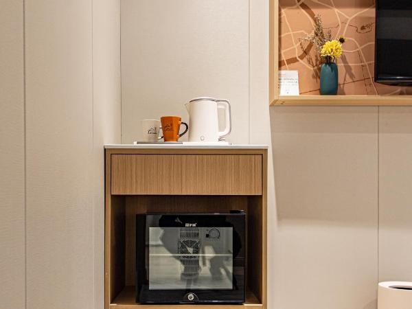 Shanghai JOYFUL YARD Hotel-Free shuttle bus from Pudong Airport and Disneylan : photo 4 de la chambre chambre lit queen-size deluxe