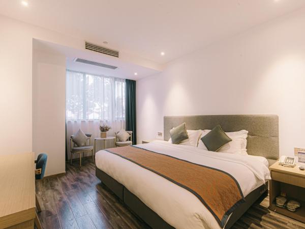 Shanghai JOYFUL YARD Hotel-Free shuttle bus from Pudong Airport and Disneylan : photo 3 de la chambre chambre standard lit queen-size