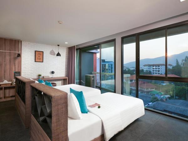 Cross Vibe Chiang Mai Decem Nimman Hotel - formerly X2 Vibe Chiang Mai Decem - SHA Extra Plus : photo 1 de la chambre suite studio triple