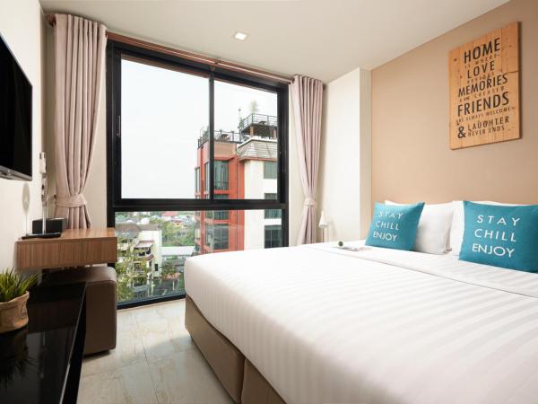 Cross Vibe Chiang Mai Decem Nimman Hotel - formerly X2 Vibe Chiang Mai Decem - SHA Extra Plus : photo 1 de la chambre suite d'angle familiale triple