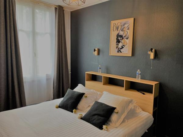 Hôtel La Réserve de Brive : photo 4 de la chambre suite familiale