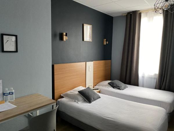 Htel La Rserve de Brive : photo 10 de la chambre suite familiale