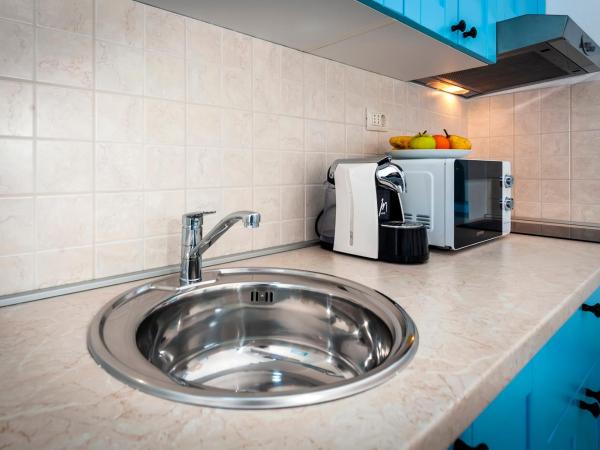 Apartments & Rooms La casa Barbaro : photo 3 de la chambre studio