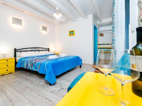 Apartments & Rooms La casa Barbaro : photo 9 de la chambre chambre double