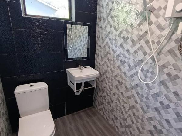 Tc theme park Guest house : photo 5 de la chambre chambre lits jumeaux avec balcon