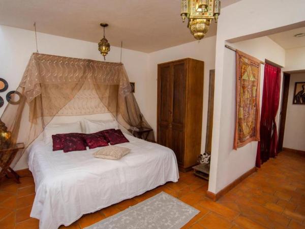 La Casa del Naranjo Hotel Boutique : photo 3 de la chambre chambre avec 2 grands lits queen-size