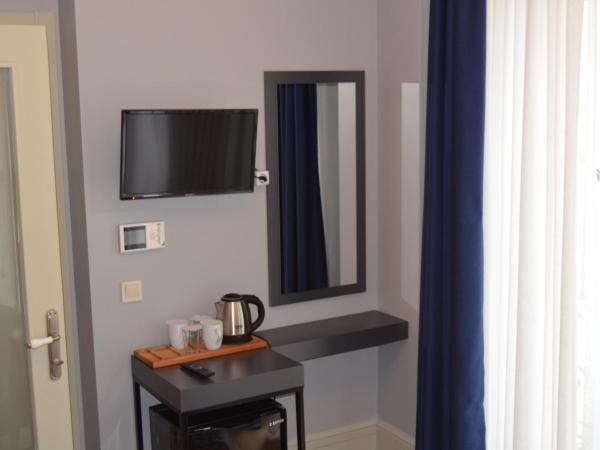 Benan Apartment : photo 6 de la chambre chambre double avec salle de bains privative