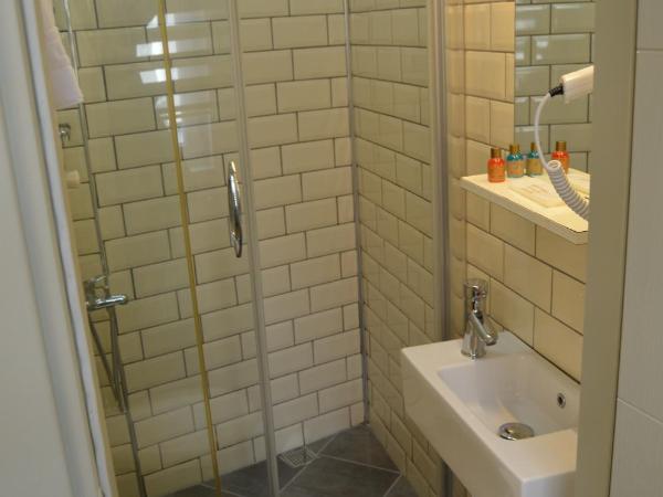 Benan Apartment : photo 3 de la chambre chambre simple avec salle de bains privative