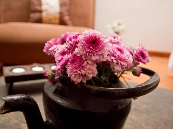 La Casa del Naranjo Hotel Boutique : photo 6 de la chambre chambre avec 2 grands lits queen-size