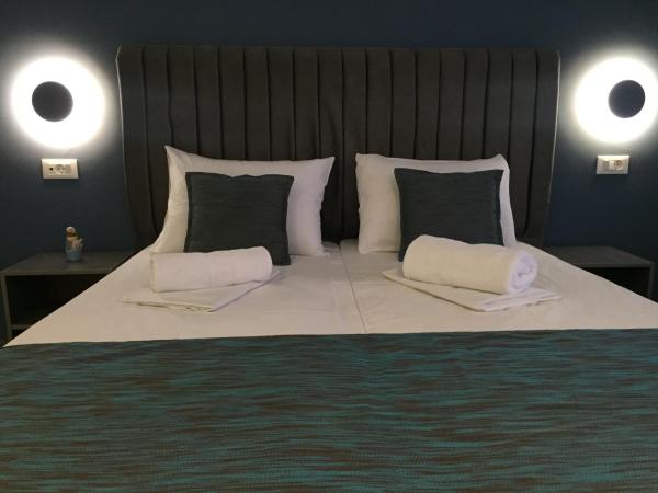 City Pearl Hotel : photo 10 de la chambre chambre double ou lits jumeaux avec lit d'appoint