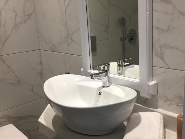 City Pearl Hotel : photo 9 de la chambre chambre double ou lits jumeaux avec lit d'appoint