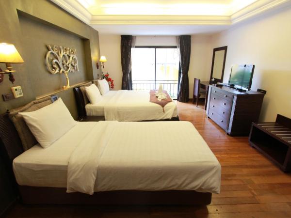 LK Mantra Pura Resort : photo 2 de la chambre chambre triple deluxe