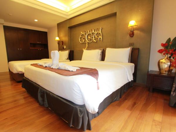 LK Mantra Pura Resort : photo 1 de la chambre chambre triple deluxe