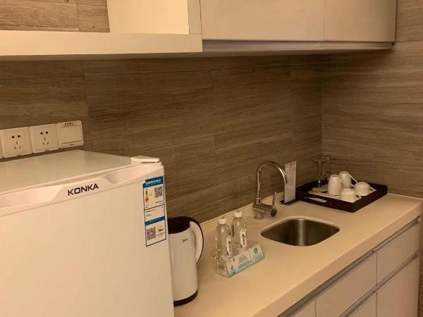 Guangzhou Fangyuan Hotel : photo 2 de la chambre appartement avec balcon