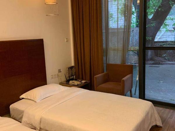 Guangzhou Fangyuan Hotel : photo 4 de la chambre chambre double ou lits jumeaux avec balcon