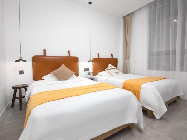 Xi Shan Hotel : photo 2 de la chambre appartement en duplex