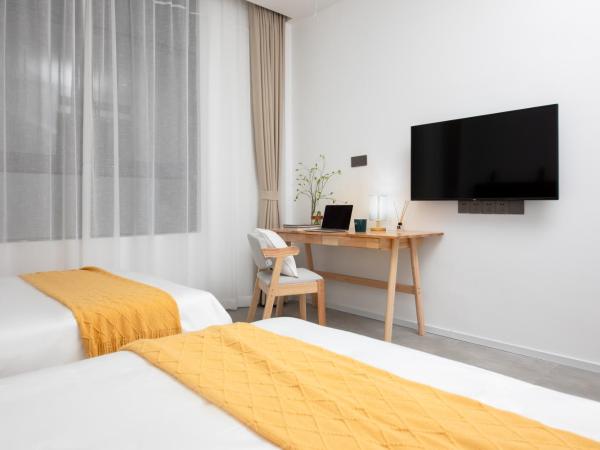 Xi Shan Hotel : photo 1 de la chambre appartement en duplex