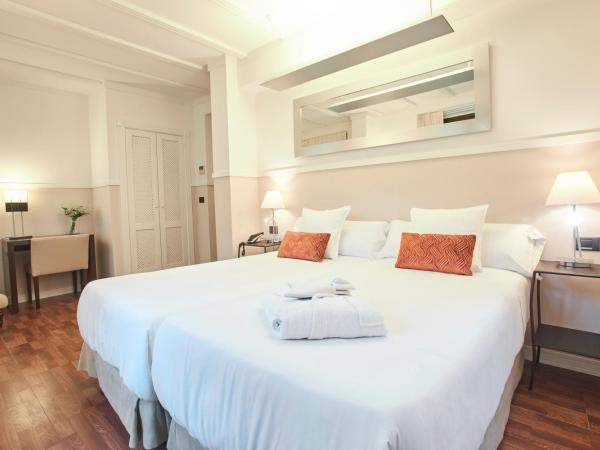 U-Sense Sevilla Centro : photo 2 de la chambre chambre double ou lits jumeaux