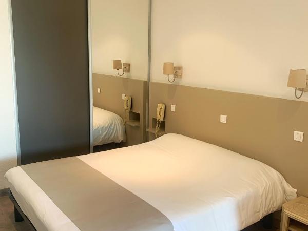Hôtel Beau Soleil : photo 1 de la chambre  chambre triple - rez-de-chaussée