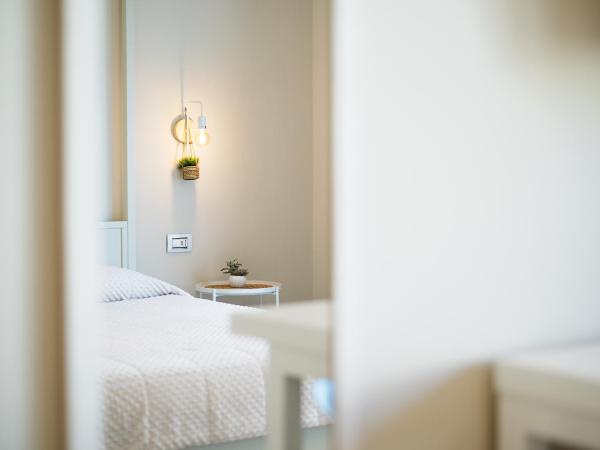 Enjoy Your Stay - Guest House - Olbia : photo 3 de la chambre chambre deluxe (2 adultes + 1 enfant)