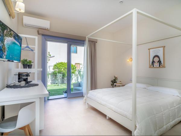 Enjoy Your Stay - Guest House - Olbia : photo 2 de la chambre chambre deluxe (2 adultes + 1 enfant)