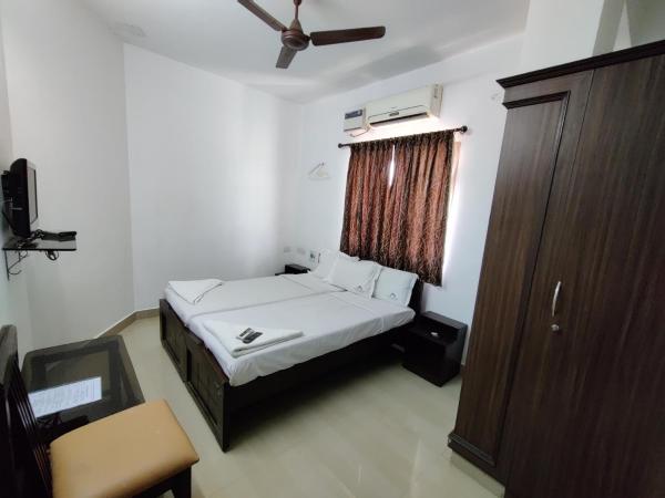 Swarna Sudarshan Service Apartments Sholinganallur : photo 8 de la chambre chambre double ou lits jumeaux Économique 