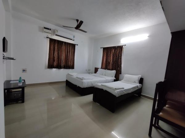 Swarna Sudarshan Service Apartments Sholinganallur : photo 10 de la chambre chambre double ou lits jumeaux Économique 