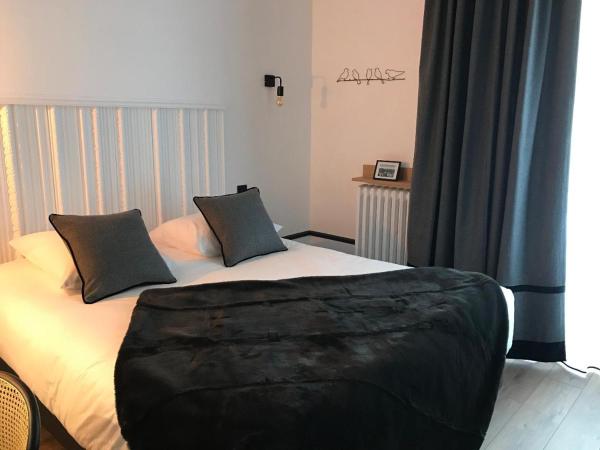 Le Grand Hôtel Mont Dore : photo 3 de la chambre chambre double - vue sur jardin