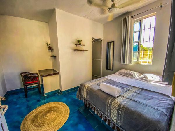 Shaka House : photo 5 de la chambre chambre double avec salle de bains privative
