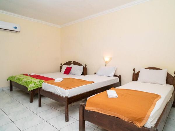 RedDoorz near Kampus 3 UTY Yogyakarta : photo 8 de la chambre chambre familiale