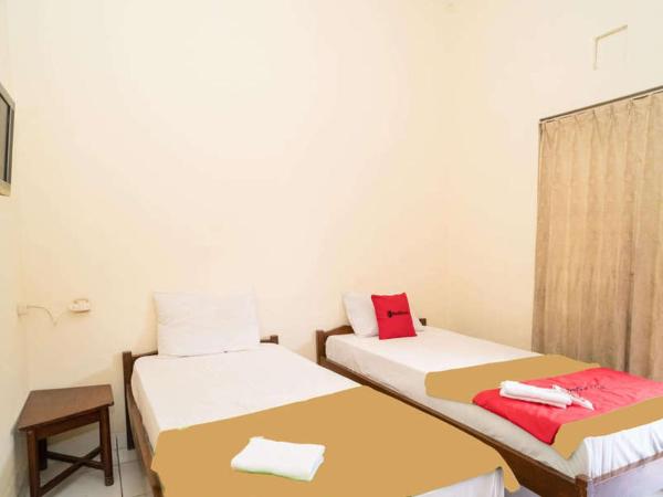 RedDoorz near Kampus 3 UTY Yogyakarta : photo 10 de la chambre chambre lits jumeaux
