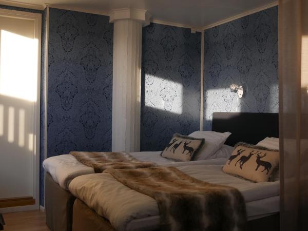 Hotel Golden Circle Suites : photo 2 de la chambre suite golden circle avec sauna