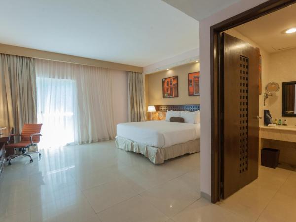 Wyndham Merida : photo 3 de la chambre chambre lit king-size deluxe - accessible aux personnes à mobilité réduite
