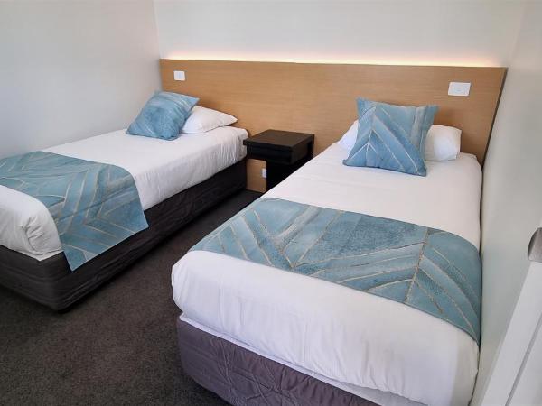 Hideaway of Rotorua : photo 3 de la chambre chambre familiale de luxe avec baignoire spa